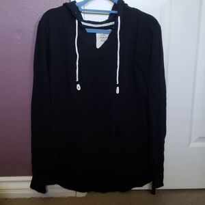 Black hoodie with lower cut neckline